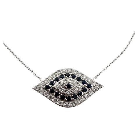 14 Karat White Gold Diamond and Sapphire Evil Eye Necklace For Sale at ...