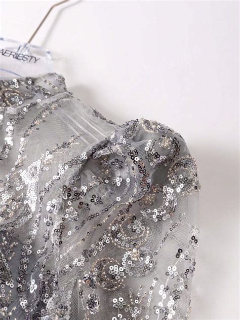 Faeriesty Combinaison élégante en satin avec broderie de sequins ...