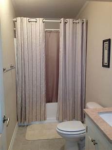 Bathroom Shower Curtains Ideas by Hanging Shower Curtains To Make Small Bathroom Look Bigger Bathroom Shower Curtains Ideas