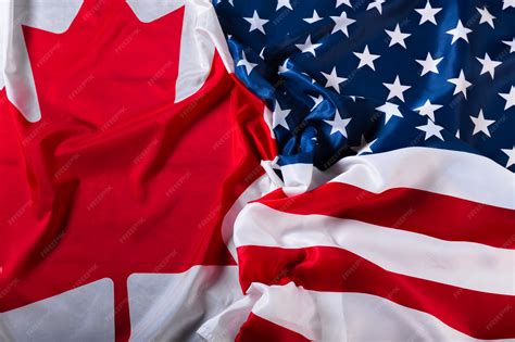 Premium Photo | American and canadian flags together