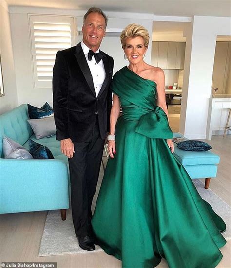 Julie Bishop, 69, shows off her toned arms and taut midriff in chic all ...