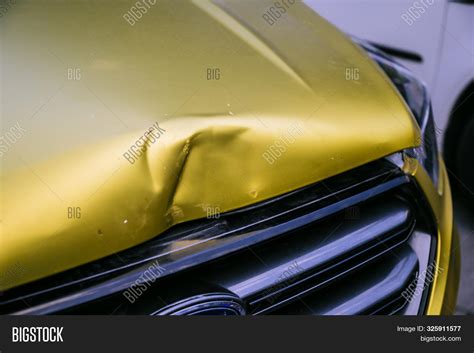 How To Fix A Dented Car Hood