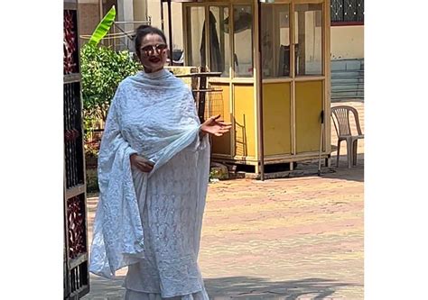 Rekha makes a rare appearance as she steps out to cast vote; flaunts ...