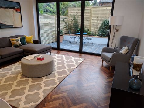 Our walnut parquet wood flooring in a modern living room | Wood parquet ...