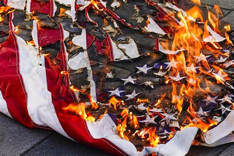 Person Detained for Burning US Flag Near White House After Trump Order ...