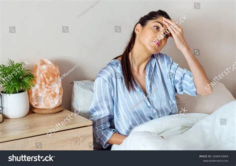 Young Woman Sitting Bed Headache Wake Stock Photo 2266433669 | Shutterstock