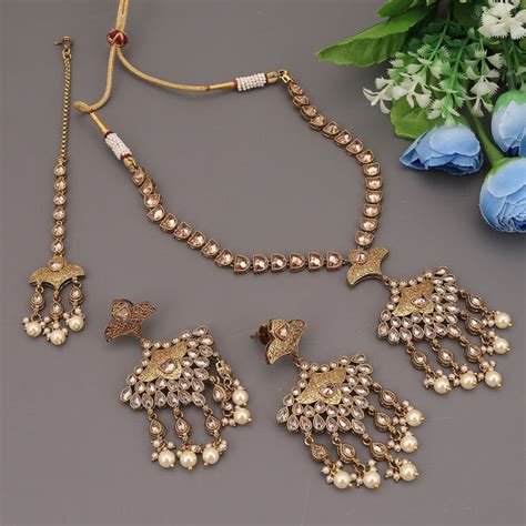 Sukkhi Attractive Fascinating Gold Plated Kundan & Pearl Necklace Set ...