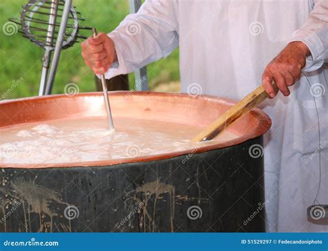 Cheesemaker Checks the Temperature of the Boiling Milk in the Po Stock ...
