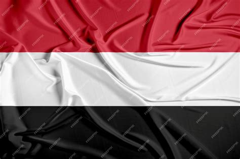 Premium Photo | Yemen official national flag of silk fabric texture ...