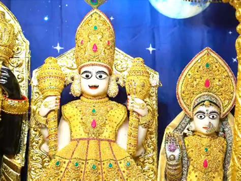In the temple of Vadtal, the enshrined deities were adorned with ...