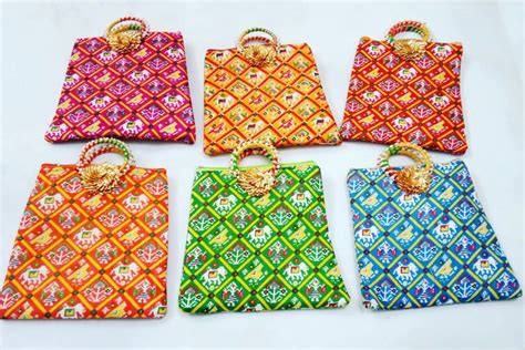 LAMANSH Patola print hand bags for haldi mehendi sangeet wedding retur ...