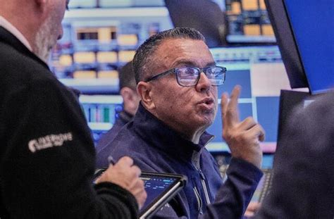 Falling Tech Stocks and a Plunge for Bitcoin Hit Wall Street