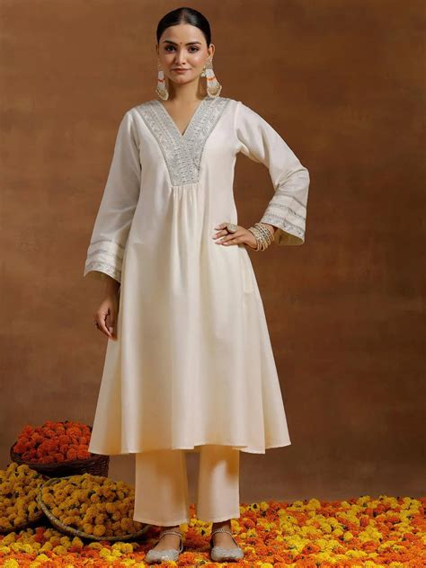 Buy Off white Yoke Design Silk Blend A-Line Kurta With Trousers Online ...