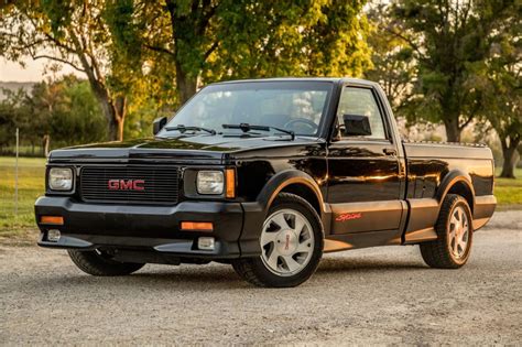 Download A stunning GMC Syclone in action Wallpaper | Wallpapers.com