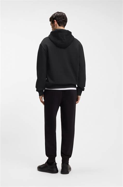 HUGO - Cotton-terry relaxed-fit hoodie with logo print - Black