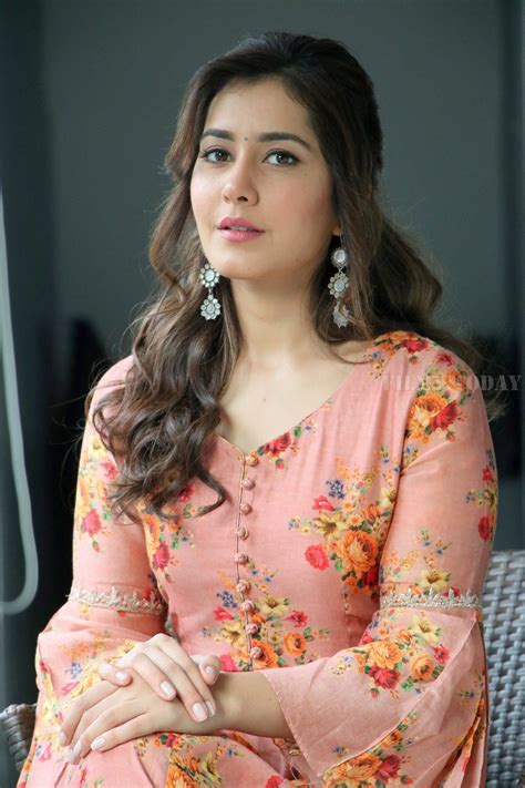 Rashi Khanna Photos at Adanga Maru Movie Promotions | Floral print ...