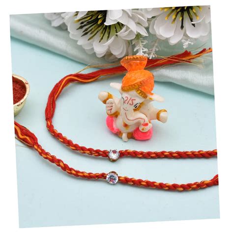 Evisha 2 pcs Simple Elegant Moli Thread with Stone Rakhi with Ganesh ...