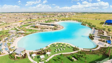 Crystal Lagoon opens in Katy's Sunterra community | khou.com