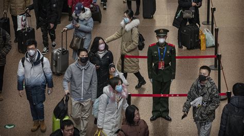 China Expands Virus Lockdown, Encircling 20 Million - The New York Times