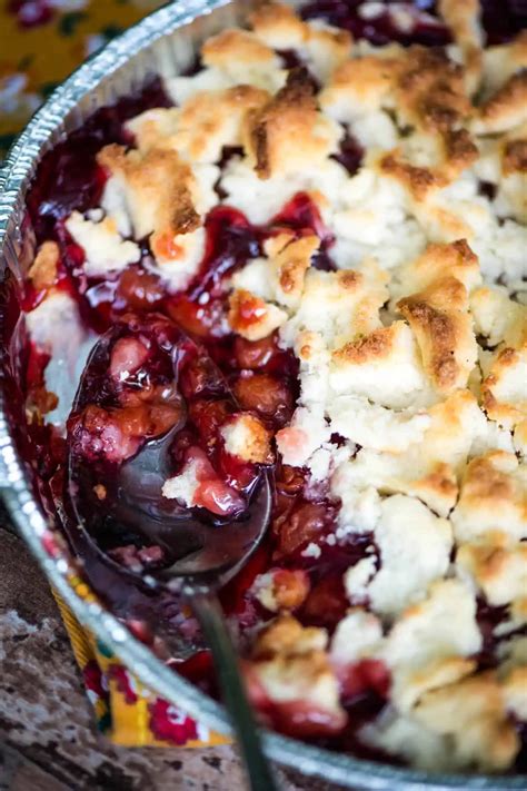 Easy Dutch Oven Cherry Cobbler Over the Campfire - Adventures of Mel