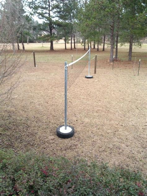 How to make volleyball poles | Backyard playground, Volleyball court ...