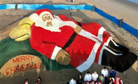 Noted sand artist Sudarsan creates giant Santa Claus sculpture with ...