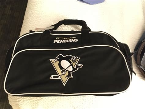 Just found a whole rack of this bag at TJ Maxx... in Traverse City MI : r/penguins