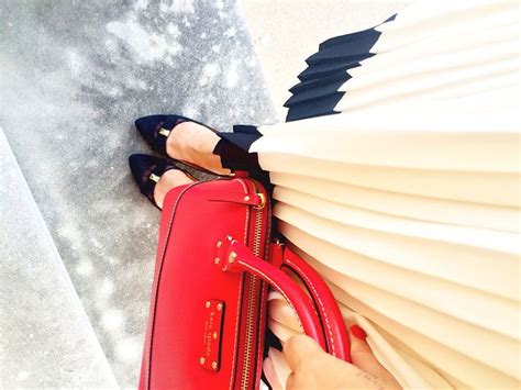 Pleated skirt with a red Kate Spade purse. #ootd #work Visit ...