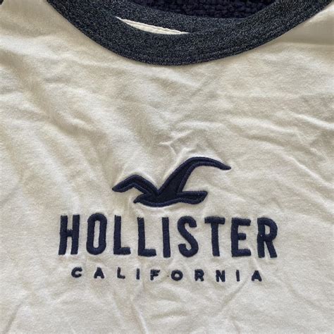 Hollister Co. Men's White and Navy T-shirt | Depop