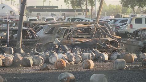 Massive propane fire destroys at least 30 cars, 2 buildings | 12news.com