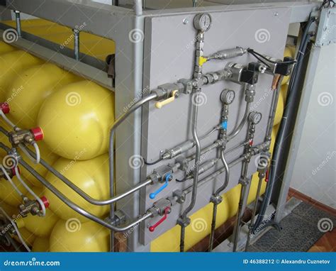 Yellow Compressed Natural Gas Cylinders Stock Photo - Image of cylinder ...