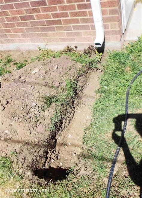 How to Bury a Gutter Downspout | How to install gutters, Easy ...