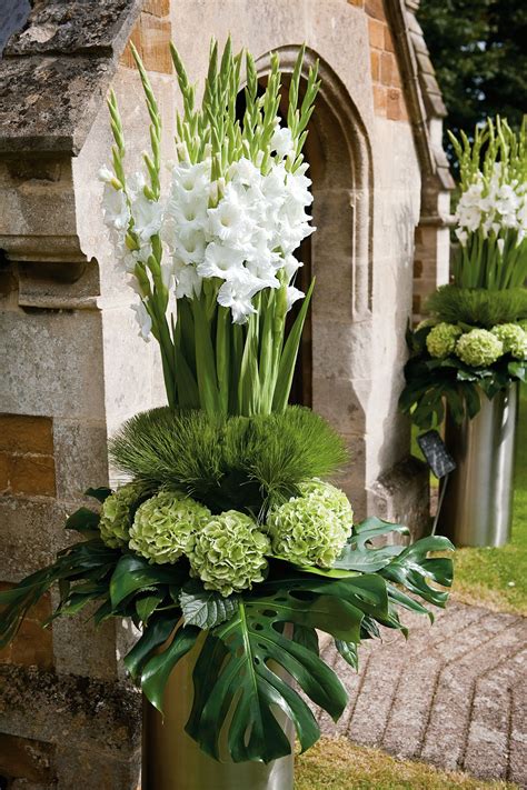Modern White Wedding Pictures (BridesMagazine.co.uk) | Pure white, Grasses and Exotic