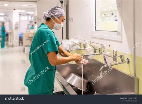 Nurse Wearing Mask Washing Hands Hospital Stock Photo 2404017867 ...
