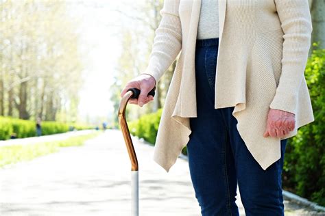 How to Use a Cane to Walk and Climb Stairs — Snug Safety