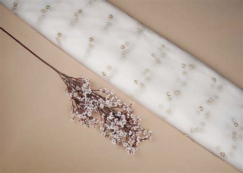 White Net Fabric With All Over Buti Of Sequins, Katdana And Bead Work