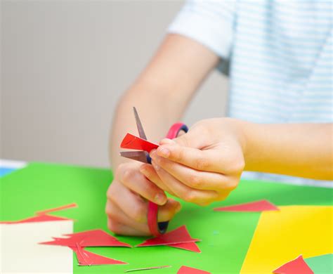 Image result for Child Using Scissors