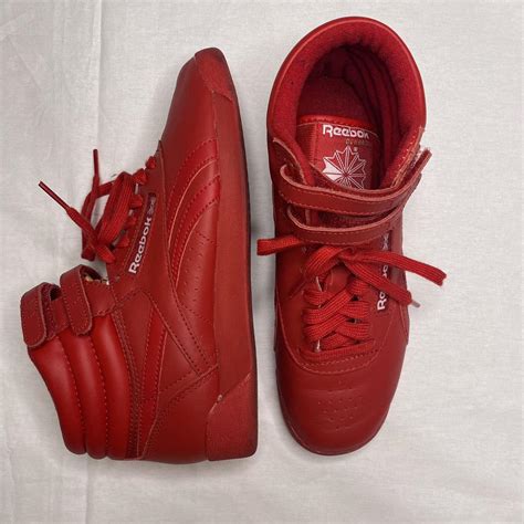 Red Reebok Midtops with classic velcro straps In... - Depop