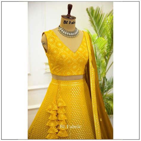 Shadding Yellow color Mirror & Sequence Embroidery work Designer Lehen ...