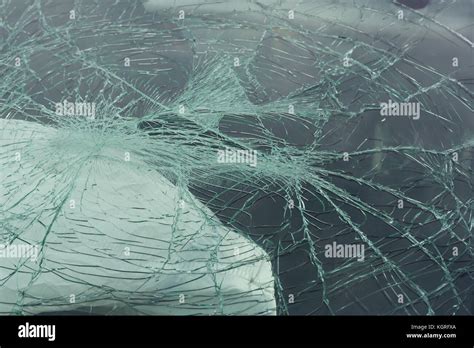 Accident damaged windscreen or windshield on a car with a deployed ...