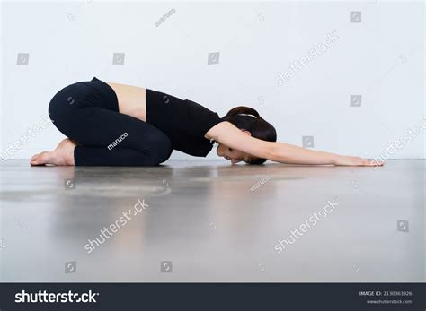 Woman Doing Yoga Child Pose Stock Photo 2130363926 | Shutterstock