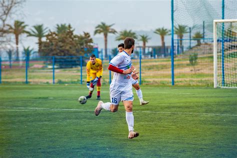 Photo Of People Playing Soccer During Daytime · Free Stock Photo