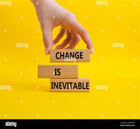 Change is Inevitable symbol. Wooden blocks with words Change is ...