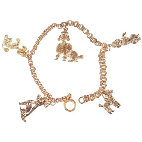 Heavy Solid 14k Gold Charm Bracelet with Charms For Sale at 1stDibs