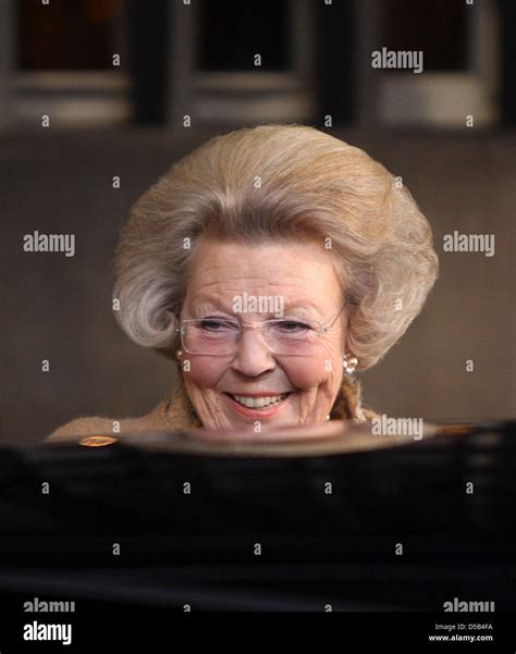 Queen Beatrix of the Netherlands leaves the Royal Palace in Amsterdam ...