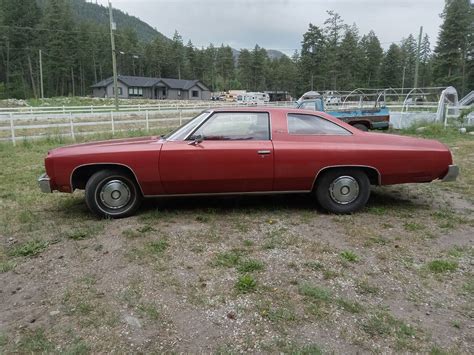 An Old Lady Won This 1976 Impala, Barely Drove It, Eventually Abandoned It in a Barn - autoevolution