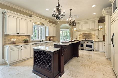 Elegant kitchen with white kitchen cabinets and espresso island Quartz ...