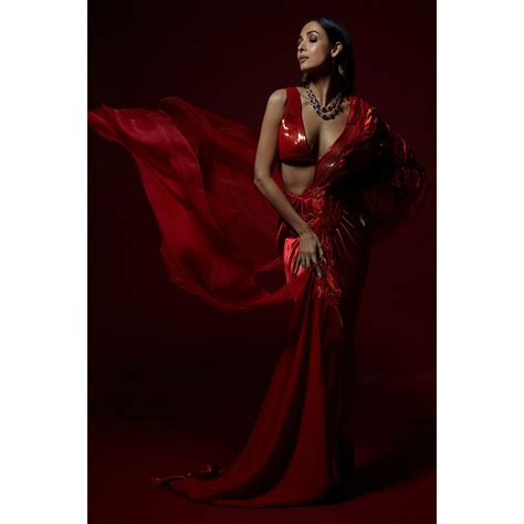 Take Malaika Arora’s red Amit Aggarwal pre-draped sari to your cocktail ...