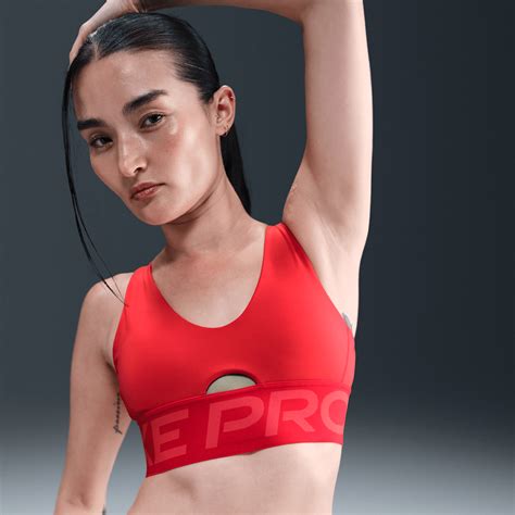 Womens Red Sports Bras. Nike JP
