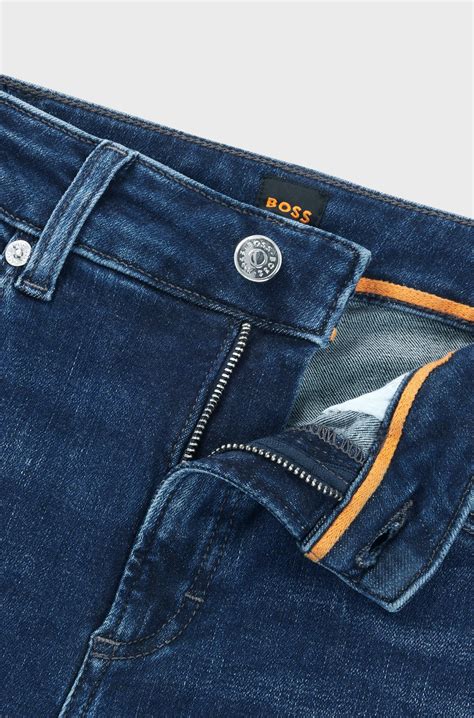 BOSS - Blue jeans in distressed stretch denim with frayed hems - Dark Blue